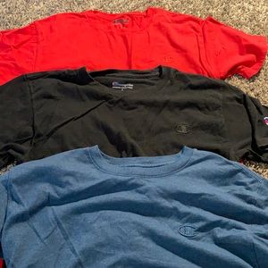 red , navy , and black small champion shirts